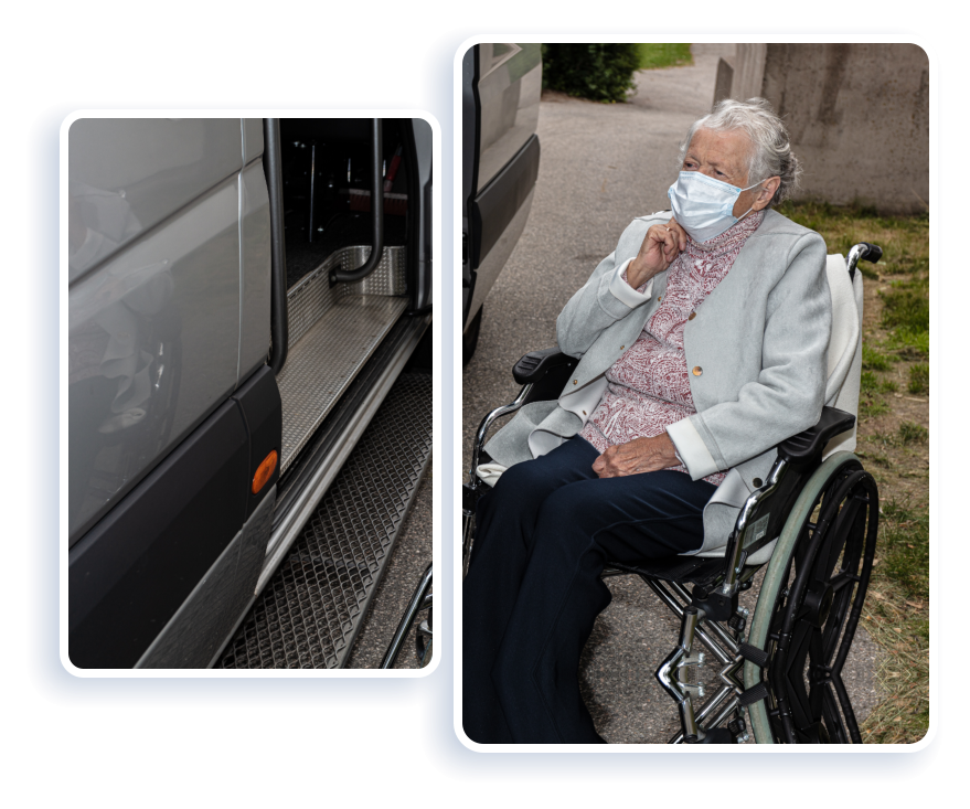 elderly woman in wheelchair beside the car